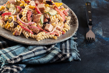 Fusilli pasta salad with smoked turkey