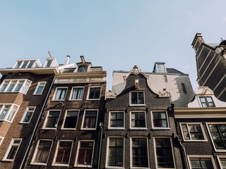 The typical elongated, crooked and charming rows of houses in Amsterdam.
