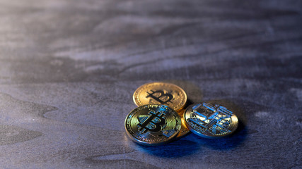 bitcoin coins on a wooden surface