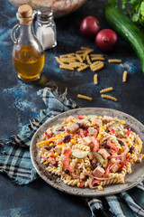 Fusilli pasta salad with smoked turkey