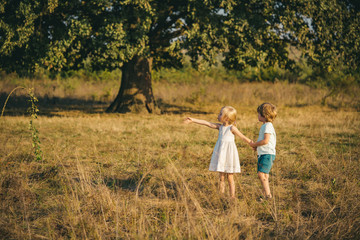 Little family farmers. Farming and agriculture cultivation. Little farmer in village. Toddler age....
