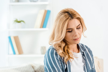 frustrated woman with bad mood in living room