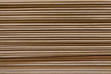 Texture of a large stack of cardboard, background