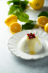 Homemade panna cotta with lemon curd