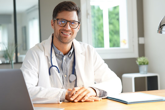 Portrait of a smiling doctor in office