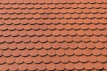 detail of new ceramic shingle roof tile background pattern
