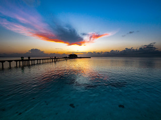 Sunset on the beach of a Maldives island. South Male Atoll, Maldives