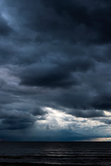 Fototapeta na wymiar Dark clouds over Baltic sea.