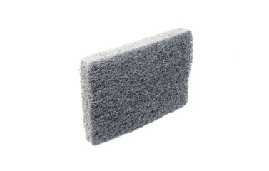 Dishwashing sponge on white background.
