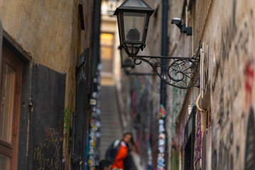 Narrow dark city street with steep stairs