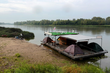 Naklejka na ściany i meble Tourist raft for rafting on the river