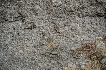 Texture of an old wall covered with paint. Background image of a worn paint coated surface