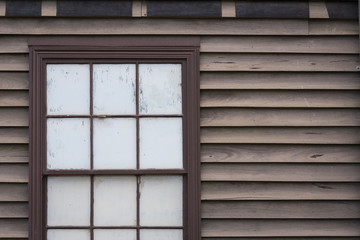 Fototapeta premium Vintage wall with wooden windows