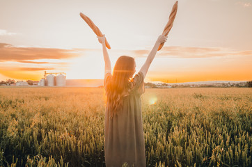Fototapeta na wymiar woman in wheat meadow