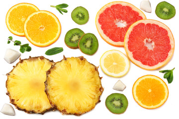Fototapeta na wymiar slices of grapefruit, kiwi fruit, orange and pineapple isolated on white background top view healthy background