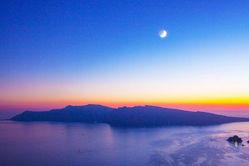 Sunset on Santorini Island, top view of Oia, Greece