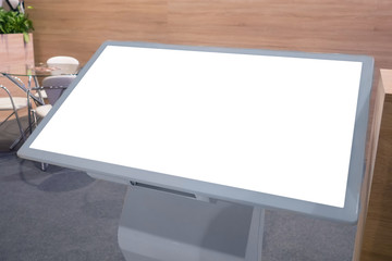 White screen, mock up, future, copyspace, template, isolated, technology concept. Electronic kioskwith horizontal blank interactive touchscreen white display at futuristic exhibition or museum