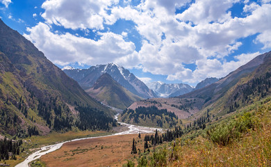 Panoramic view of the beautiful Left Talgar mountain valley with river, rocks and forest in Tian Shan mountains near Almaty city  best place for active lifestyle, hiking and trekking in Kazakhstan © kiwisoul