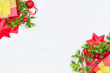Christmas background with holly berries and decorations corner