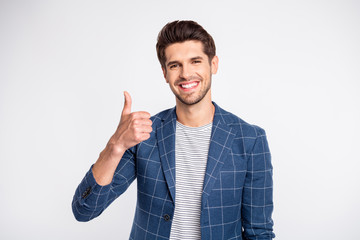 Portrait of cheerful man show thumb up advertise promo wear checkered blazer jacket isolated over...