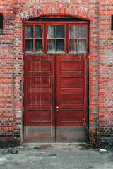 Old and red factory doors