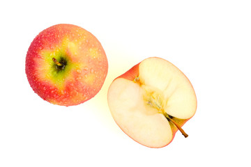Sliced wet red apples isolated on white background ready to use in designs