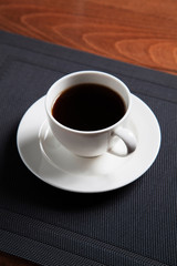 Fototapeta na wymiar coffee on white cup on table