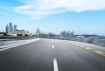 Plakat empty highway with cityscape and skyline of qingdao,China.