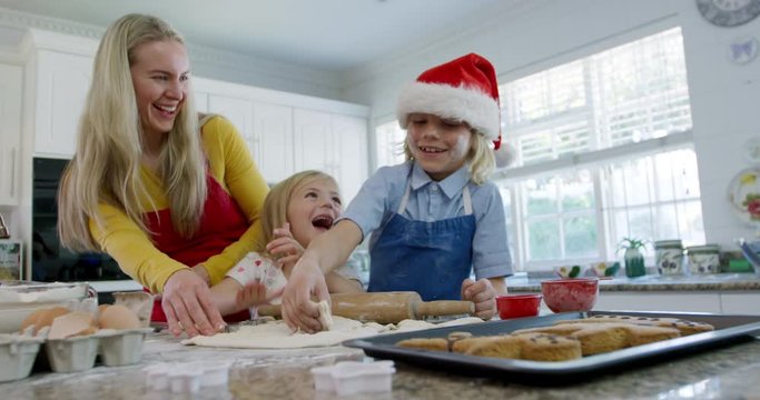 Family making Christmas cookies at home