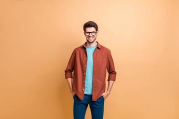 Portrait of his he nice attractive trendy cheerful cheery experienced brunet guy holding hands in...
