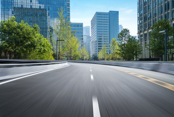 Obraz premium empty highway with cityscape and skyline of qingdao,China.