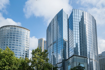 Looking Up Blue Modern Office Building