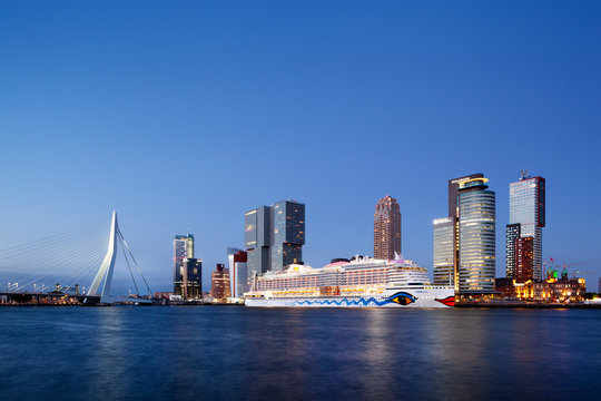 Cruise ship Aida Perla moored in Rotterdam at dusk