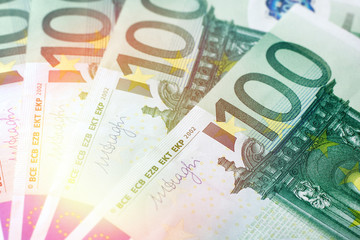 Closeup of a few paper notes in denominations of 100 euros