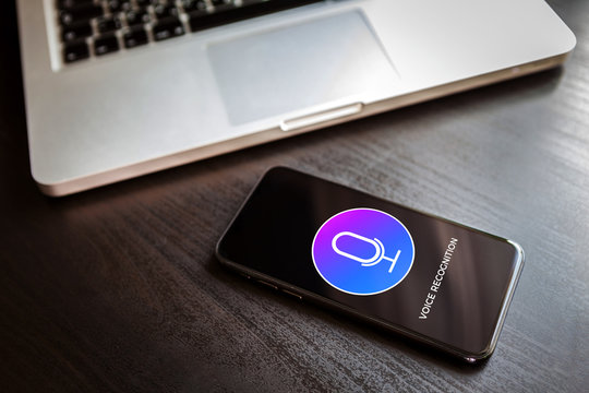 Voice Recognition Siri Artificial Intelligence siri sound speech detect and deep learning search concept. Mobile application with microphone icon on smartphone screen.