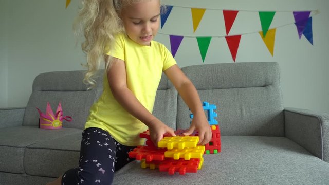 Creative female child assembly constructor parts and talk. Gimbal movement