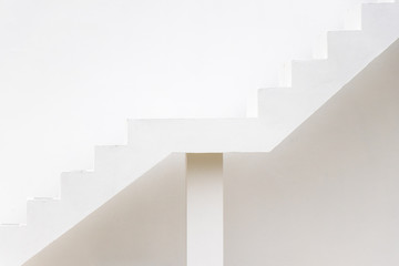 White staircase on concrete wall background (Concept for career path, target aiming, aspiration)