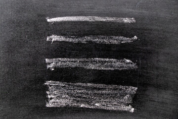 White chalk hand drawing in line shape on black board background
