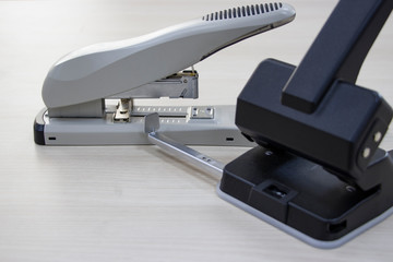 Puncher and stapler. Office items. Business. Organization of the workplace. Stationery.