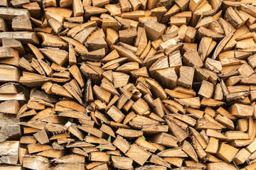 The Woodpile. Wood background and Firewood texture.
