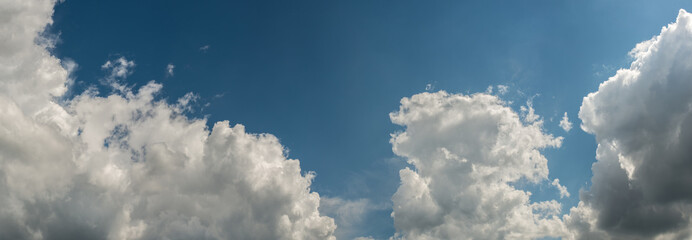 Naklejka na ściany i meble fluffy clouds panorama