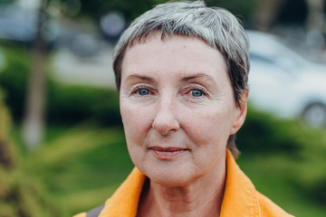 Smiling old woman portrait. anti aging concept. Portrait of a beautiful senior woman