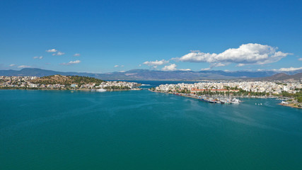 Aerial top view photo of famous old steel bridge of Halkida or Chalkida connecting mainland with Evia island, Greece