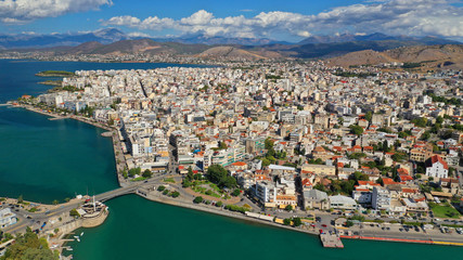Obraz premium Aerial photo of famous seaside town of Halkida with beautiful clouds and deep blue sky, Evia island, Greece