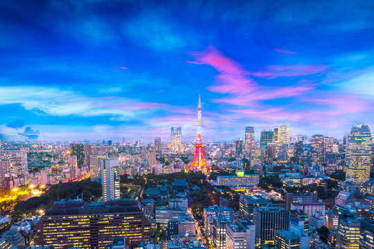 Cityscape of Tokyo, city aerial skyscraper view of office building and downtown and street of  minato in tokyo with sunset / sun rise background. Japan, Asia