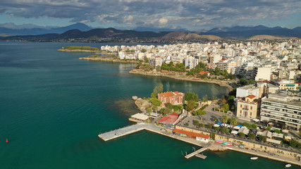 Aerial photo of famous seaside town of Halkida with beautiful clouds and deep blue sky, Evia island, Greece