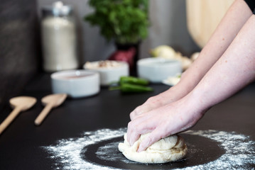 making homemade Italian-style pizza