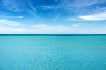 Obraz premium Turquoise seascape with blue sky and clouds, Mediterranean Sea, Italy, Europe