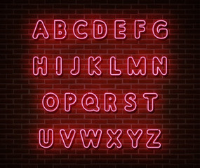 Fototapeta na wymiar Neon pink alphabet type font vector isolated on brick wall. ABC typography letters light symbol, decoration text effect. Neon alphabet font illustration