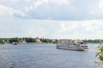 Fototapeta premium Uglich. Yaroslavl region. View of the Uglich Kremlin and the Volga river. The Church of St. Dimitry on the blood, Transfiguration Cathedral. Cruise ships berthed